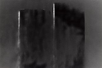 WOLF VON DEM BUSSCHE (1934-2014) A suite of 12 atmospheric photographs of the World Trade Center and Washington Square, N.Y. 1976.